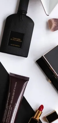 This phone live wallpaper showcases a beautiful display of high-end beauty products arranged on a table