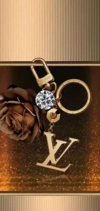This phone live wallpaper showcases a close-up of a key chain with a beautiful rose