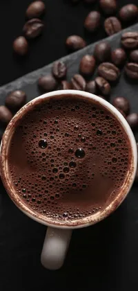 Enhance your mobile phone display with this animated live wallpaper showcasing a steaming cup of coffee and coffee beans in high-quality close-up imagery