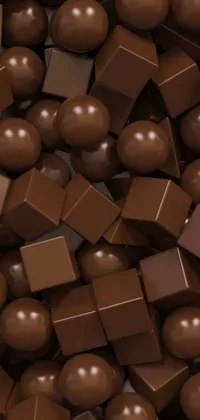Indulge in the sweet and mouth-watering beauty of this chocolate cube pile live wallpaper for your phone