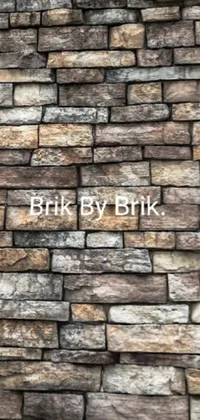 This live phone wallpaper features a close-up of a brick wall with a bright yellow fire hydrant and a colorful album cover