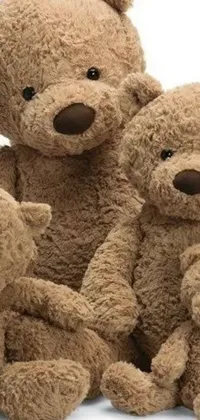 This adorable phone live wallpaper features a group of playful teddy bears sitting side by side