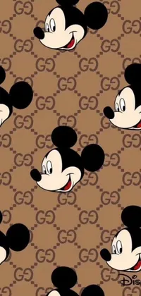 This lively and cute live wallpaper features a brown background covered in an array of playful Mickey Mouse heads in a captivating pattern