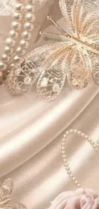 This phone live wallpaper showcases a stunning dress with pearls and flowers