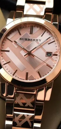 This live wallpaper features the timeless elegance of a Burberry watch perched delicately atop a black box