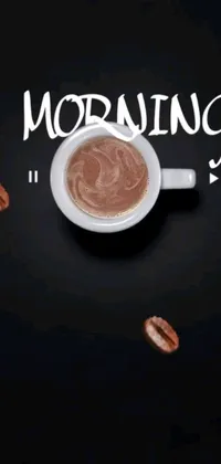 This phone live wallpaper features an elegant image of a coffee cup complemented with coffee beans, perfect for a morning vibe
