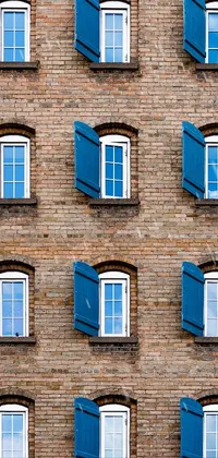 This captivating phone live wallpaper features a brick building with blue shutters on several windows and a symmetrical formation