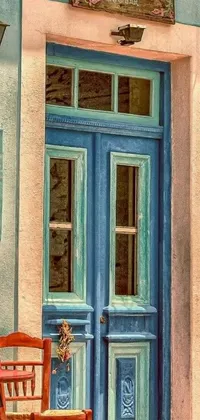 Browse through this captivating phone live wallpaper featuring cozy wooden chairs, a striking blue door, and a photorealistic painting featuring art nouveau motifs inspired by Greece