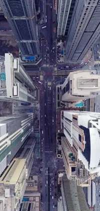 This incredible live phone wallpaper showcases a futuristic cityscape with towering buildings and busy streets