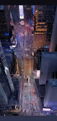 This live phone wallpaper showcases an aerial, futuristic view of the city at night