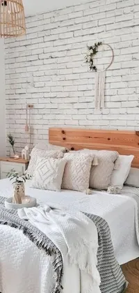 This live phone wallpaper boasts a cozy bedroom with a white brick wall and a wooden headboard as the perfect backdrop