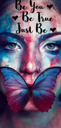 This live phone wallpaper showcases a stunning butterfly painted on a woman's face
