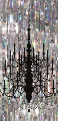 This live phone wallpaper depicts a beautiful baroque chandelier with iridescent crystals that sparkle and shine as the chandelier gently sways on a gradient background of deep purple and black