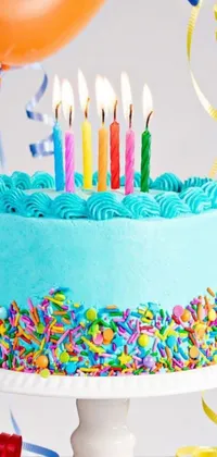 Looking for an uplifting phone live wallpaper? Look no further! This lively design by Helen Berman features a three-tiered birthday cake covered in colorful sprinkles with flickering candles adding warmth to the scene
