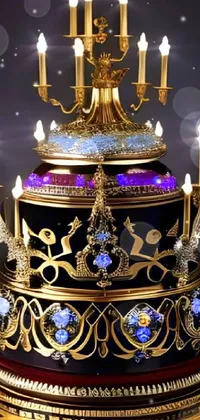 This phone live wallpaper showcases an opulent, baroque-style black and gold cake adorned with precious stones
