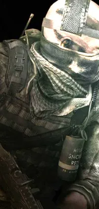 This phone live wallpaper features a digital rendering of a someone in camouflaged gear holding a gun