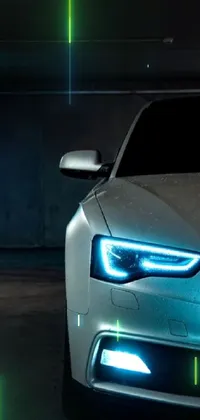 This phone live wallpaper showcases a close-up of a car parked inside a dimly lit garage