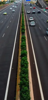 This hyper-realistic phone live wallpaper showcases a bustling highway filled with rapid traffic in the scenic landscape of Australia