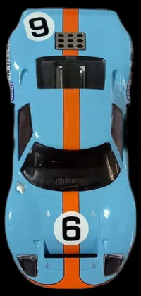 This live wallpaper features a GT40 toy car on a black background with a pop art design