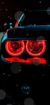 This phone live wallpaper captures the stunning tail lights of a tumblr car