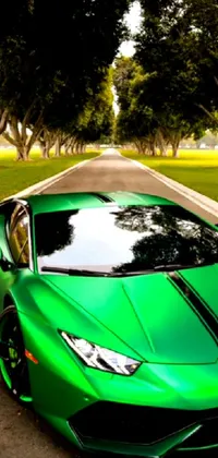 This lively phone wallpaper features a green Lamborghini sports car parked on the side of a road in a picturesque Italian town