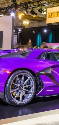This phone live wallpaper features a luxurious purple sports car displayed in a showroom, set against the stunning Bay Area skyline