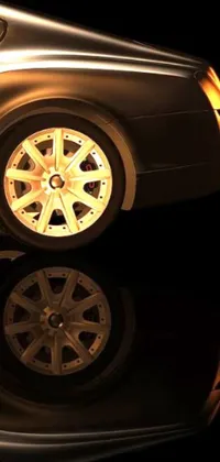 This live wallpaper captures the beauty of a shiny car on a reflective surface