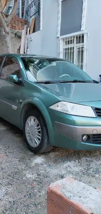 This live wallpaper showcases a green Renault Ultimo parked on a street paved with teal stones