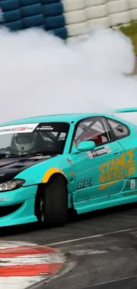 Add some action to your phone's home screen with this animated live wallpaper featuring a smoke-spewing car with eye-catching orange and cyan decals over a teal-tinted background