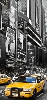 Experience the buzz of city life with this striking live wallpaper! Featuring a captivating black and white photo of a busy New York city street, the sleek silver and yellow color scheme and neon adverts inject a modern and edgy vibe to this striking wallpaper