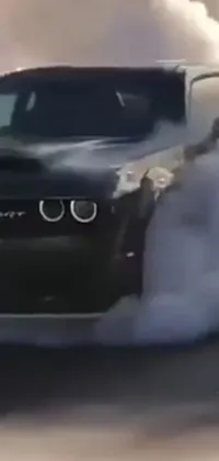 This mesmerizing phone live wallpaper depicts a car emitting a dense cloud of smoke, set against a soft dream-like background