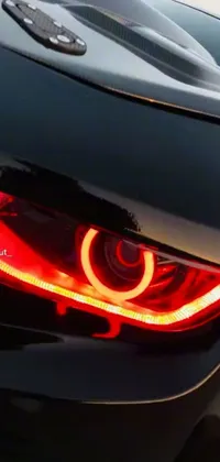 This live wallpaper showcases a breathtaking close-up of a car's tail lights designed in a romantic style