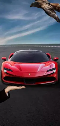 Introducing a stunning phone live wallpaper featuring a red sports car that can captivate any automobile lover's heart