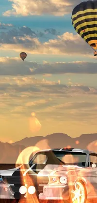 Get ready for an exciting phone live wallpaper featuring a motorcyclist, a classic car and a hot air balloon in the gulf desert
