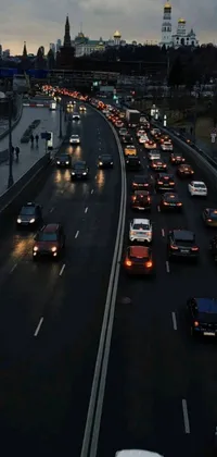 Looking for an immersive live wallpaper for your phone? Check out this amazing wallpaper that features a busy highway next to a river in Helsinki