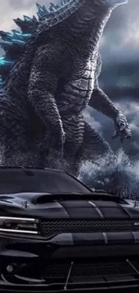 This phone live wallpaper showcases a black Dodge Charger parked in front of a towering Godzilla
