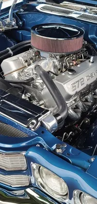 This live wallpaper for your phone showcases the intricate details of a car engine
