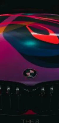 This phone live wallpaper showcases a digitally rendered purple and red car in vivid colors, inspired by synthetism art style