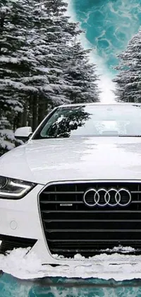 This dynamic phone live wallpaper features a stunning white car traversing a snowy road