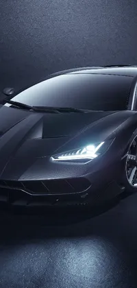 This live wallpaper features a realistic 3D render of a sleek black Lamborghini sports car in a dark room