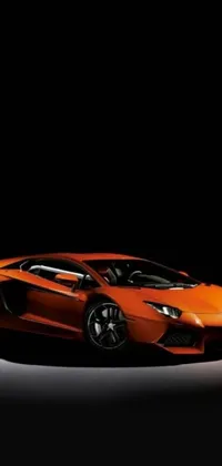 This phone live wallpaper showcases a stunning orange sports car resembling a Lamborghini