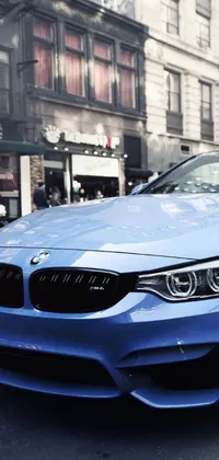 This live wallpaper features a sleek blue BMW parked alongside a roadside