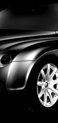 Enjoy an impressive live wallpaper for your phone featuring a photorealistic black and white digital rendering of a Bentley car