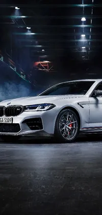 Looking for an eye-catching live wallpaper for your phone? Check out our new BMW car live wallpaper! This stunning promotional image features a sleek white BMW car parked in a dimly-lit parking garage, perfect for adding an edgy touch to your device