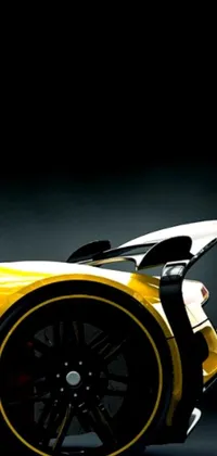 This live wallpaper for your phone features a stunning sports car in yellow parked in a dark room