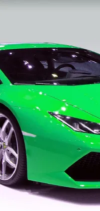 This live wallpaper features a green sports car on a white floor, boasting a high gloss finish and a realistic design