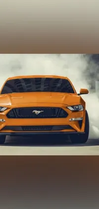 This live wallpaper features an eye-catching orange Mustang car image, which is currently trending on Pexels
