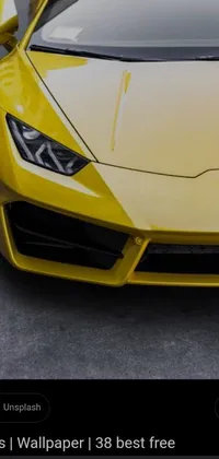 This live phone wallpaper showcases a striking yellow sports car parked in a parking lot
