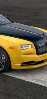 This phone live wallpaper showcases a yellow Rolls Royce parked on a runway and inspired by the Renaissance era