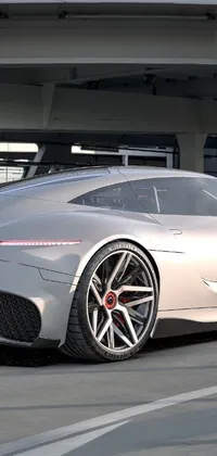 Get your phone revved up with a stunning live wallpaper featuring a silver sports car parked in a parking garage